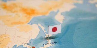 Map of Japan with flag pin placed nearby