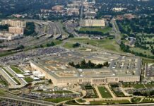 Pentagon THREATENS Senator Kelly – Court-Martial Looms Aerial view of the Pentagon surrounded by highways and urban areas