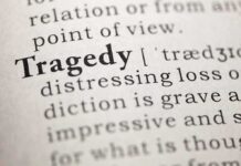 Father And Sons SLAUGHTER Daughter — HORRIFIC Details Close-up of the word 'Tragedy' in a dictionary with its definition