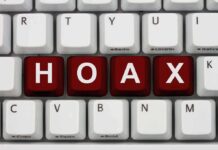 Embassy Order Or Hoax? Iran Rumor Close-up of a computer keyboard with the word HOAX spelled out in red keys