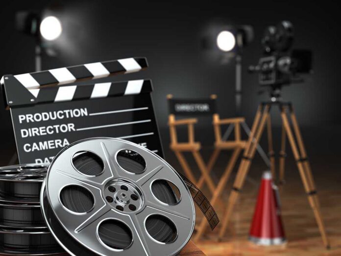 Film production equipment including a clapperboard, film reel, and directors chair