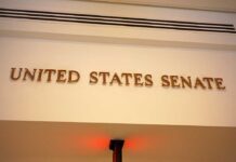 Sign displaying United States Senate in a government building