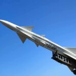 Carrier-Killer Missile Deal? China Denies A military missile pointed upwards against a clear blue sky