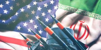 Missile launcher in front of US and Iran flags