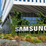 Samsung’s Trillion-Dollar SHOCK! Samsung building with large sign and greenery.