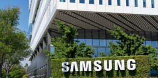 Samsung building with large sign and greenery.