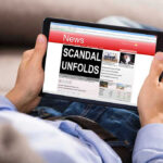 SCANDAL: How TAXPAYERS FUND Inmates Contact With Minors! Person reading tablet with headline Scandal Unfolds.