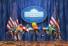 Trump Talks Peace With Putin and Zelensky as War Continues Multiple microphones at White House press briefing podium.