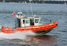 Coast Guard Opens Fire Near Miami Coast Guard boat speeding on the water.