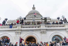 U.S. Biolab Program Abroad Revealed in Files Crowd gathered on steps of Capitol building.