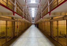 Political Prisoner Death Highlights Nicaragua’s Crackdown Long hallway with prison cells on both sides.