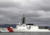 First U.S. Drone Boat Rescue Near Iran Crash A U.S. Coast Guard ship docked under cloudy skies