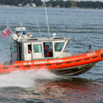 Boat Strikes Kill Hundreds, Cocaine Keeps Coming Coast Guard boat speeding on the water.