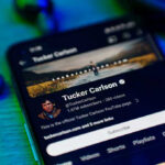 The biggest battle over free speech isn’t in Congress Smartphone displaying a YouTube channel profile page.
