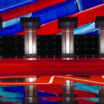 GOP Insider Sounds the Alarm on 2026 Four debate podiums on a CNN stage background.