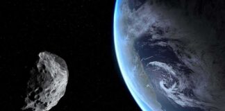 Asteroid passing near Earth in space