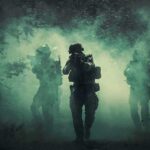 Lebanese Army Deployment Marks First Test of U.S. Soldiers move through dense smoke in a forest