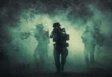 Lebanese Army Deployment Marks First Test of U.S. Soldiers move through dense smoke in a forest