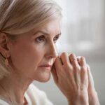 The Simple Dinner Habit That May Help Protect Your Memory Woman with short blonde hair in thoughtful pose
