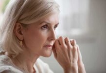 The Simple Dinner Habit That May Help Protect Your Memory Woman with short blonde hair in thoughtful pose