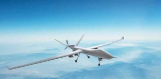 Unmanned aerial drone flying over mountains