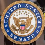 Washington Seizes Oil, Demands Budgets Official seal of the United States Senate with microphones in the background