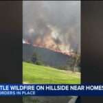 SoCal fire prompts evacuations as smoke billows over homes; video shows flames near golf course
