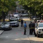 A Deadly Workplace Prank Now Has Criminal Consequences Police officers secure a residential street with patrol cars and yellow tape