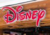 Disney store sign on wooden storefront