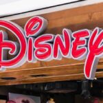 Disney store sign on wooden storefront