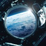 Earth seen through a spacecraft window