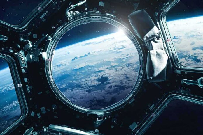 Earth seen through a spacecraft window