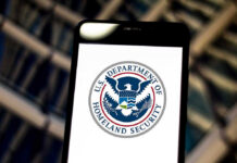 DHS Border Video Sparks NFL Dispute U.S. Department of Homeland Security logo on smartphone.