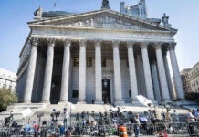 TRUMP BANS Big Three: Reporters Blocked at the Gate Teddy Williams at courthouse steps with media outside a neoclassical building