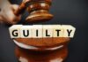 Influencer Case Heads to Court Judge's gavel above blocks spelling guilty