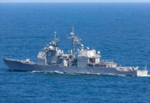 Get Hammered: U.S.-Iran Tensions Escalate Gray naval warship cruising on open sea