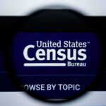 Magnifying glass over United States Census Bureau website