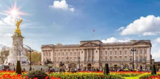 Buckingham Palace with Victoria Memorial and flower gardens