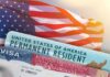 U.S. flag with visa and permanent resident cards