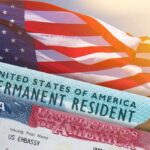 U.S. flag with visa and permanent resident cards