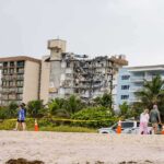 Partially collapsed beachfront condominium building