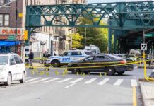 Verdict Reached in Super Bowl Reporter’s Death Police cars block a city intersection with yellow crime scene tape