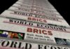 BRICS Warning Jolts Oil Markets Stack of newspapers highlighting BRICS and world economy