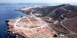 Coastal tent camp on a rocky peninsula