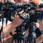 Undisputed Exit Electrifies Dublin World Boxing television cameras on tripods at a media event