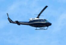 Inside Iran: U.S. Rescue Mission Ends in Safe Return Helicopter flying against a blue sky