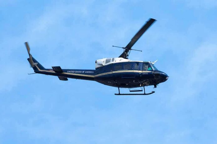 Helicopter flying against a blue sky