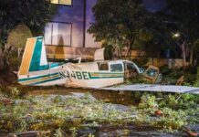 small airplane crash in residential area at night