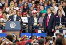 Rally Stunner: Trump Announces Medal of Freedom Ron DeSantis speaks at a rally as Donald Trump looks on; Badri Patarkatsishvili, Susie Blake, Grynet Molvig, and Martha Firestone Ford in crowd