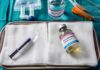 Lethal Injection Attempt Fails in Tennessee Medical tray with syringe and pentobarbital vials on gauze